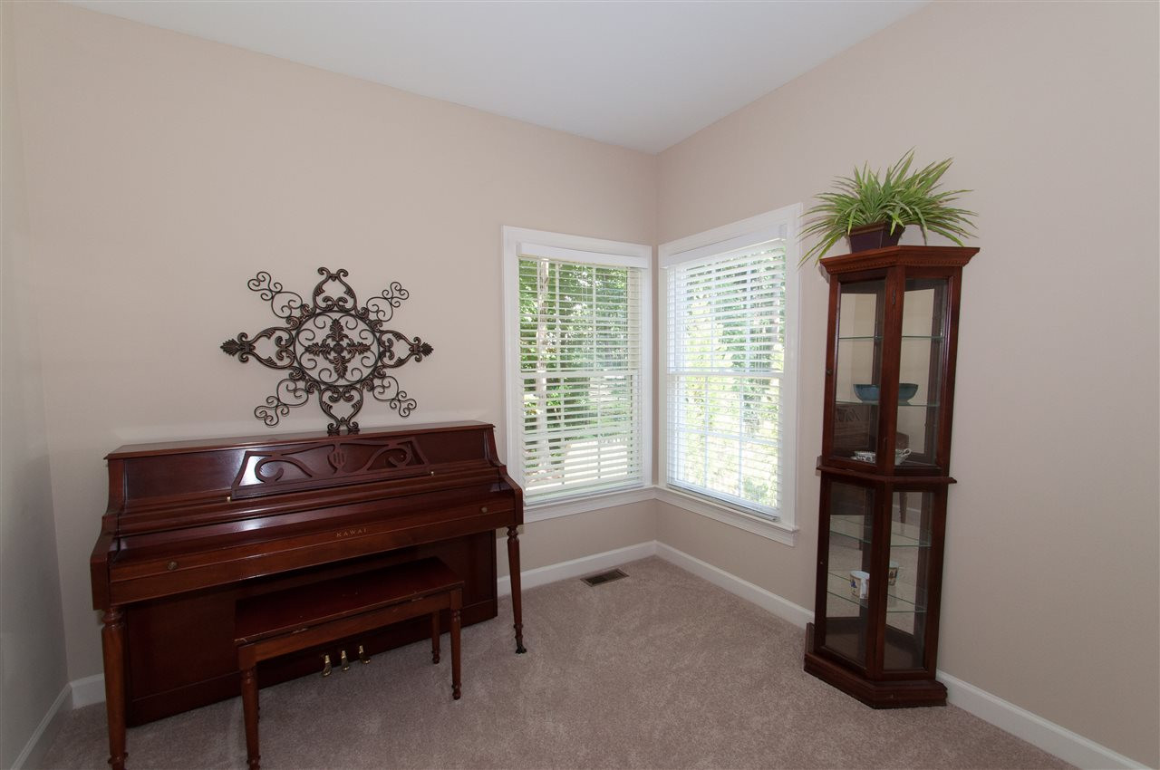 8905 Braceridge Road Raleigh, NC 27613 - Photo 10 of 25 First floor bedroom or office with French doors offers a total of 4 bedrooms First floor bedroom