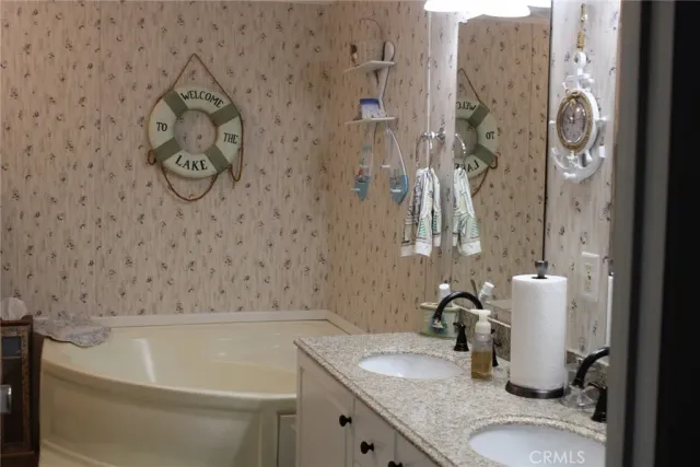 a bathroom with a sink and toilet