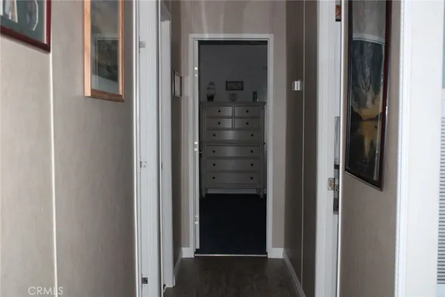 a view of a bathroom from a hallway