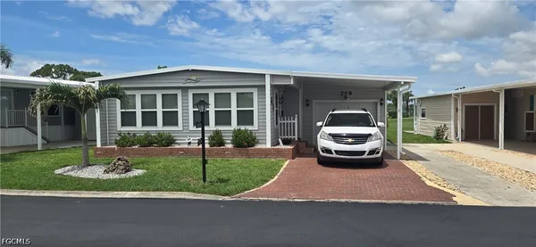 a car parked in front of a house