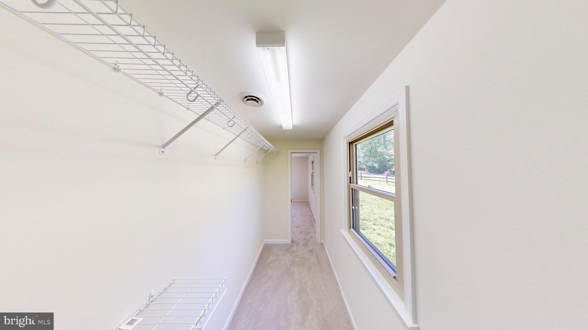 729 West Watersville Road Mount Airy, MD 21771 - Photo 18 of 42 a view of hallway with windows