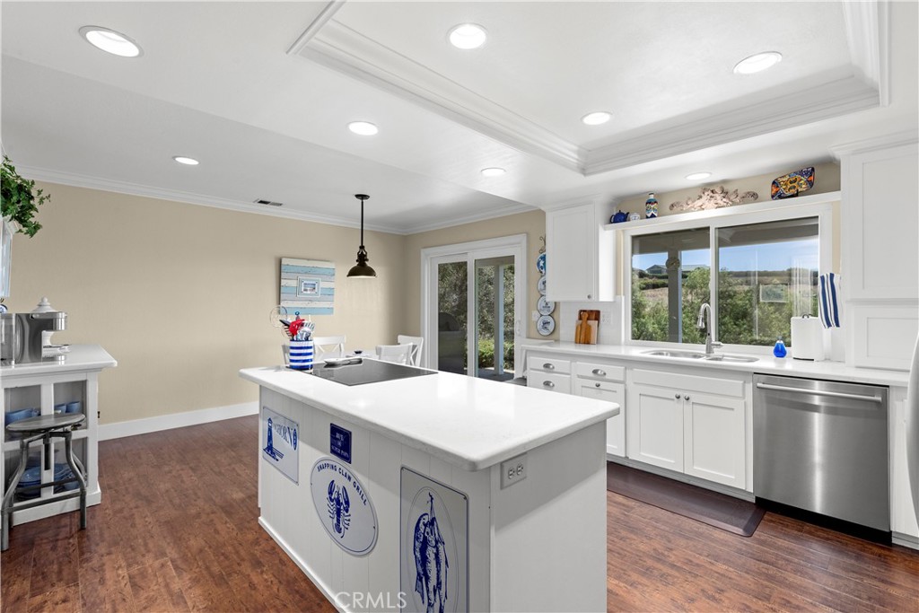 3237 Canonita Drive Fallbrook, CA 92028 - Photo 14 of 55 a kitchen that has a sink and a stove in it