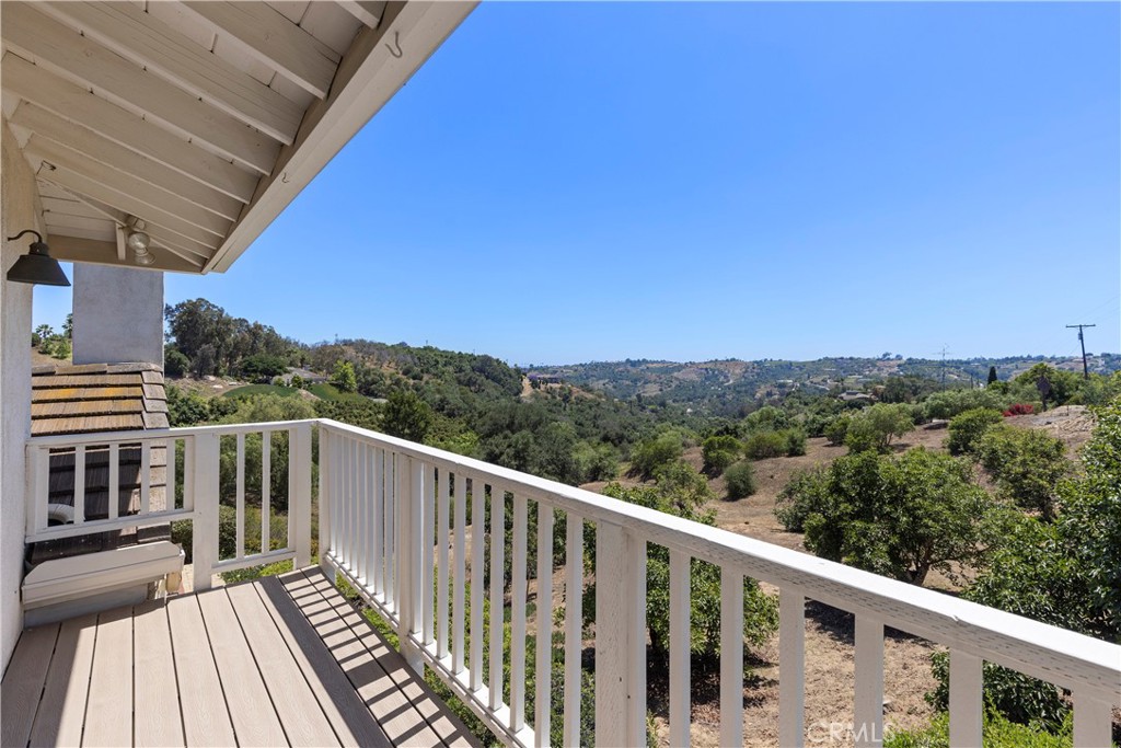 3237 Canonita Drive Fallbrook, CA 92028 - Photo 19 of 55 a view of a balcony with wooden floor