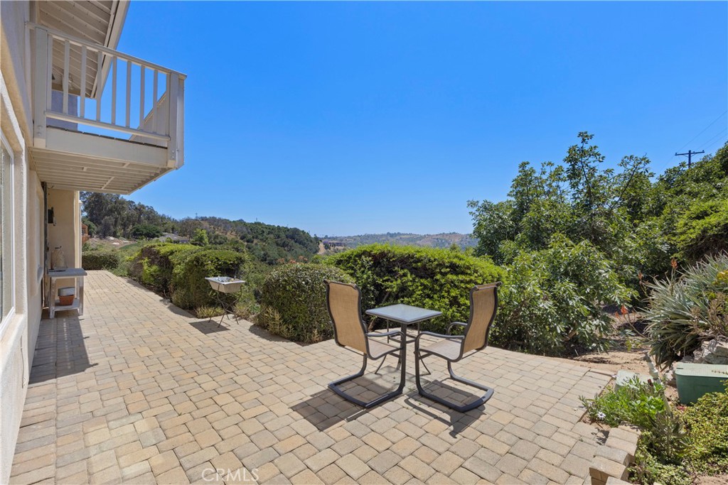 3237 Canonita Drive Fallbrook, CA 92028 - Photo 20 of 55 a view of a chairs and table in the terrace