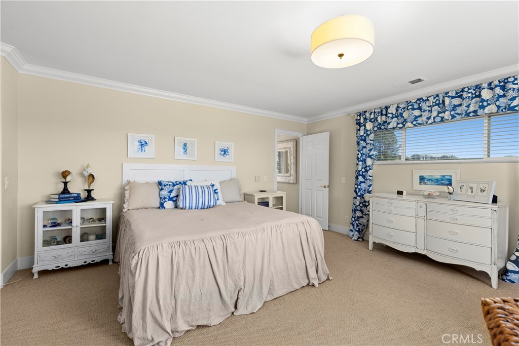 3237 Canonita Drive Fallbrook, CA 92028 - Photo 21 of 55 a bedroom with a bed and a dresser