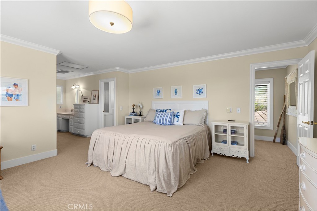 3237 Canonita Drive Fallbrook, CA 92028 - Photo 22 of 55 a bedroom with a bed and a cabinets