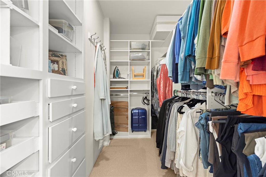 3237 Canonita Drive Fallbrook, CA 92028 - Photo 26 of 55 a view of walk in closet with clothes and shoes