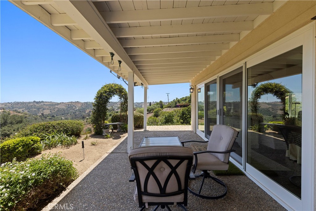 3237 Canonita Drive Fallbrook, CA 92028 - Photo 33 of 55 a view of a porch with furniture and a yard