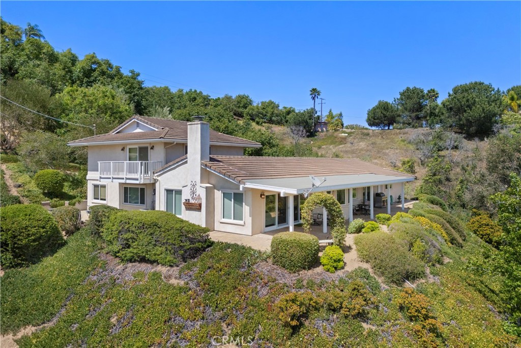 3237 Canonita Drive Fallbrook, CA 92028 - Photo 42 of 55 a front view of a house with a yard