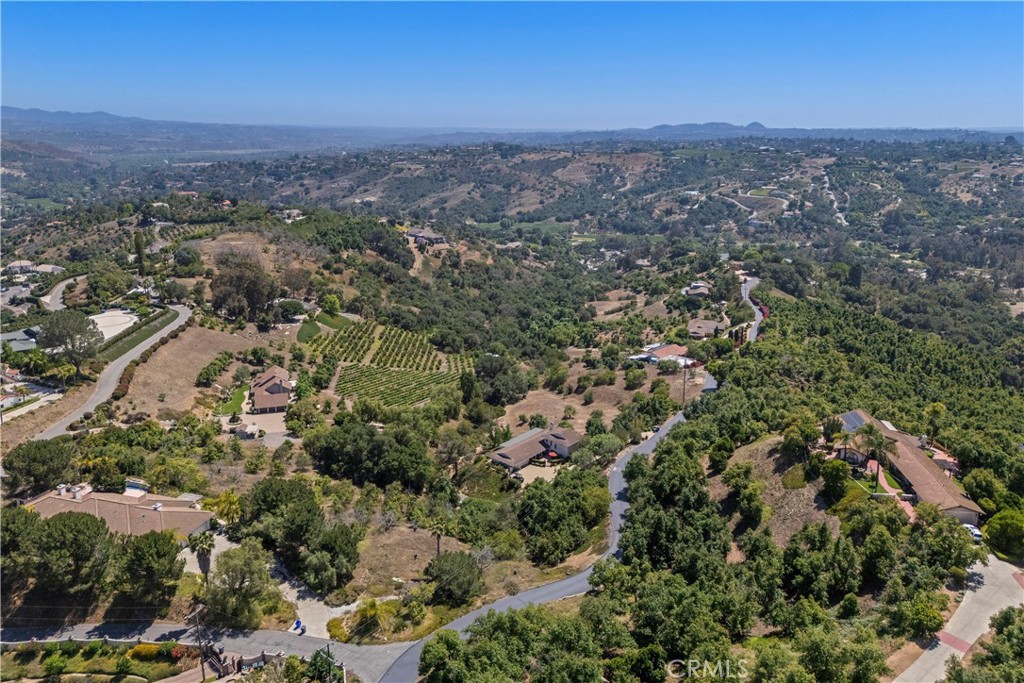 3237 Canonita Drive Fallbrook, CA 92028 - Photo 47 of 55 an aerial view of house with yard and mountain view in back