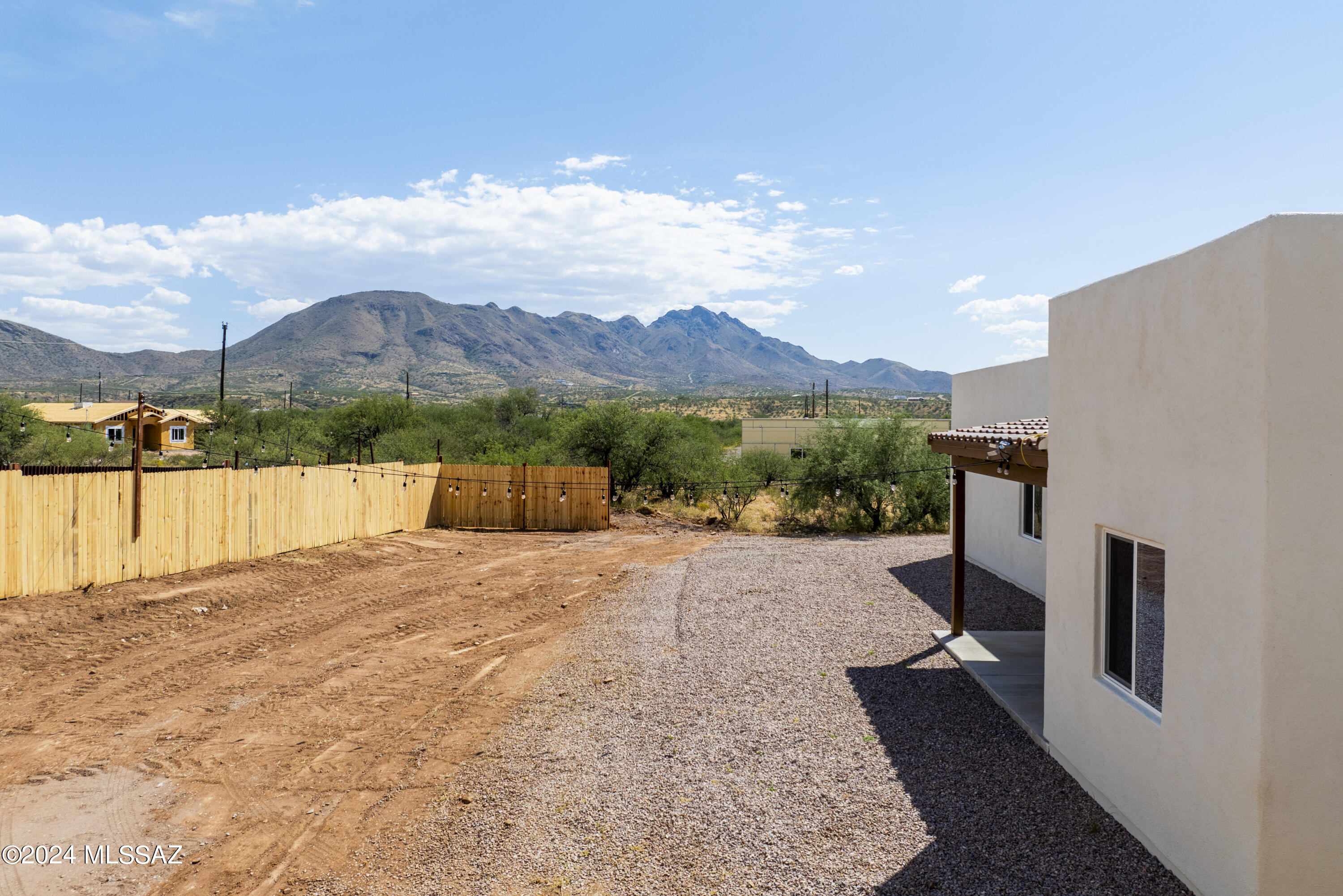 1835 America Court Rio Rico, AZ 85648 - Photo 3 of 35 a view of an outdoor space and a yard
