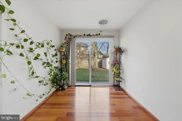 a view of entryway with wooden floor