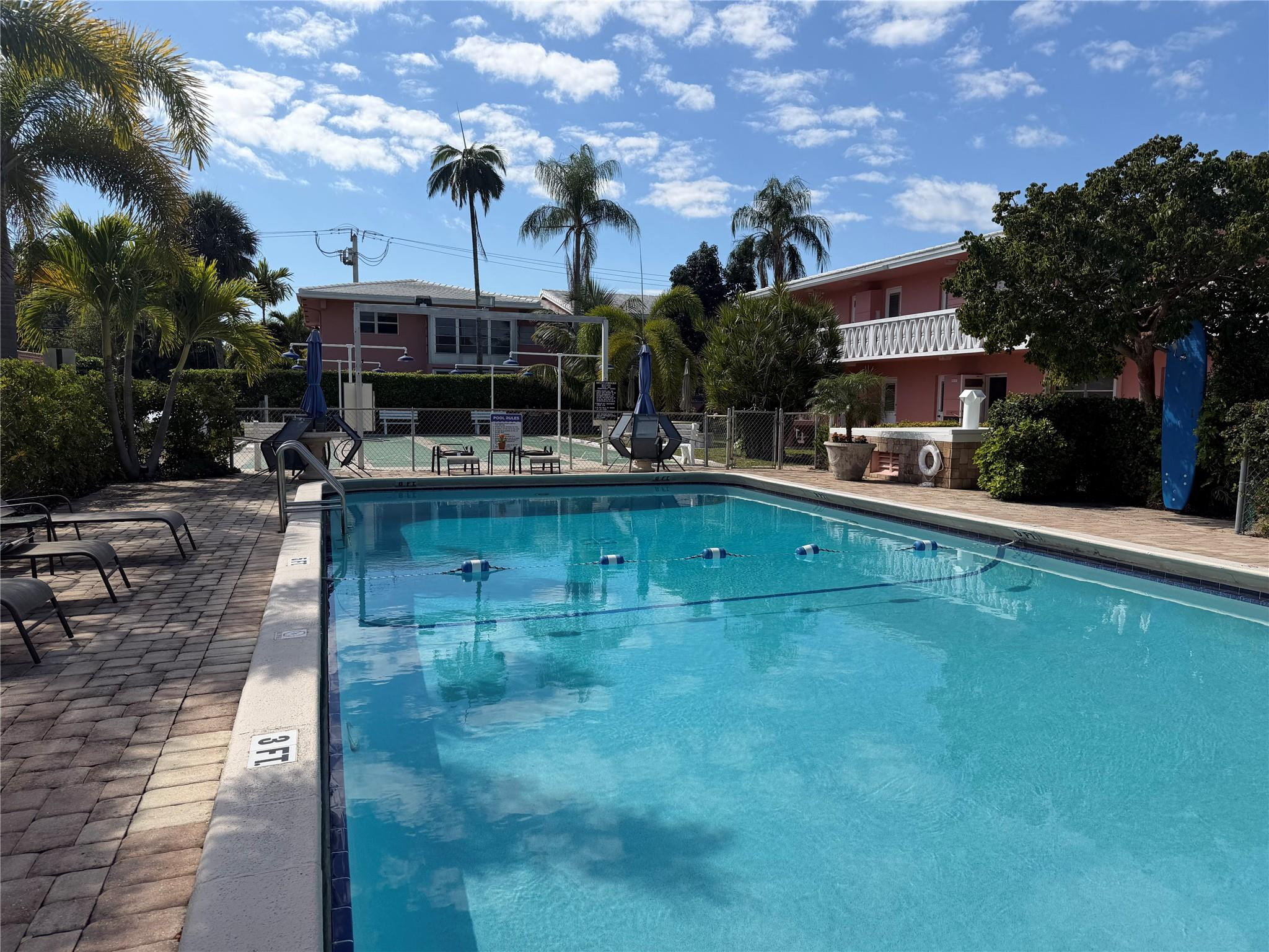 Undisclosed Address Boca Raton, FL 33431 - Photo 2 of 32 a view of a swimming pool with a patio