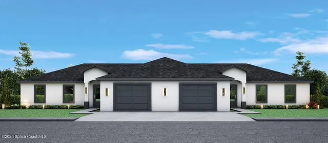 front view of a house with a yard