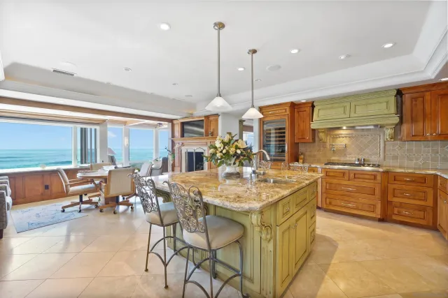 a view of a living room and entry way