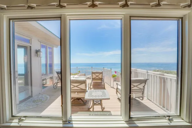 a spacious bathroom with a double vanity sink and a mirror