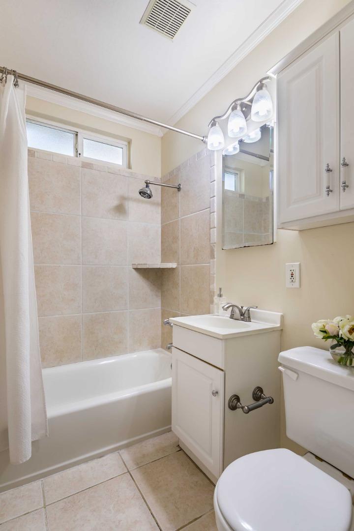 1110 Embarcadero Road Palo Alto, CA 94303 - Photo 19 of 23 a bathroom with a sink toilet and shower