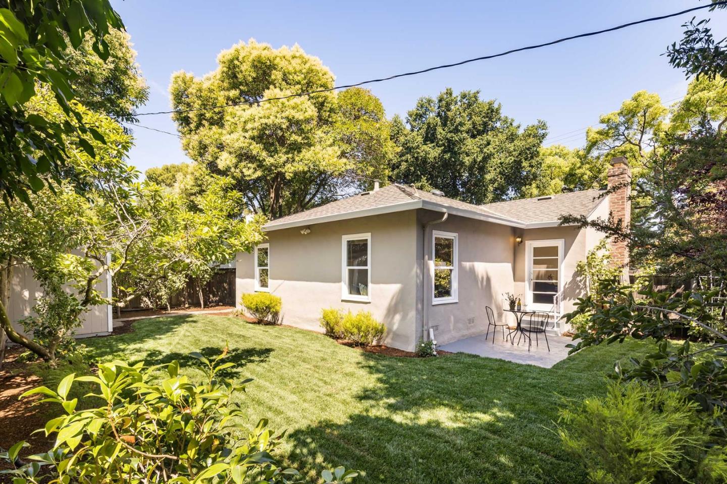 1110 Embarcadero Road Palo Alto, CA 94303 - Photo 22 of 23 a view of a house with a yard