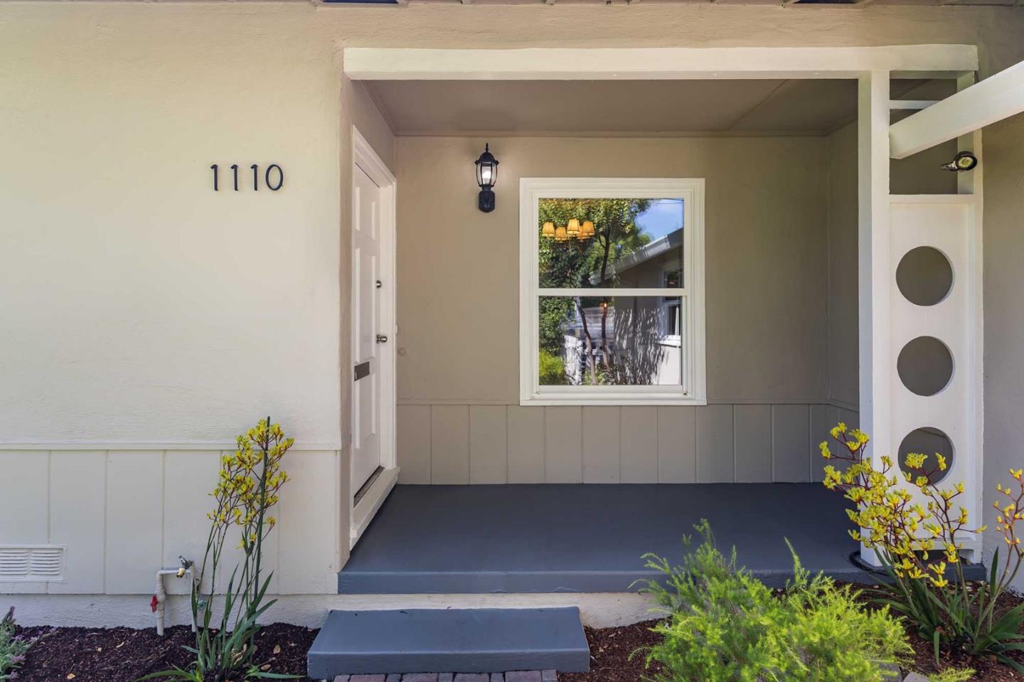 1110 Embarcadero Road Palo Alto, CA 94303 - Photo 4 of 23 a front view of a house with garden