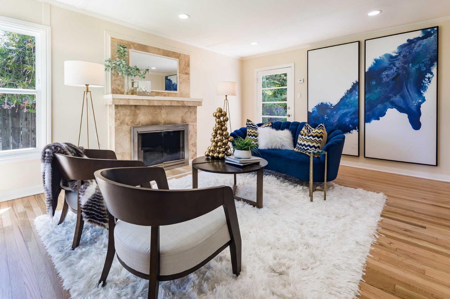 1110 Embarcadero Road Palo Alto, CA 94303 - Photo 5 of 23 a living room with furniture and a fireplace