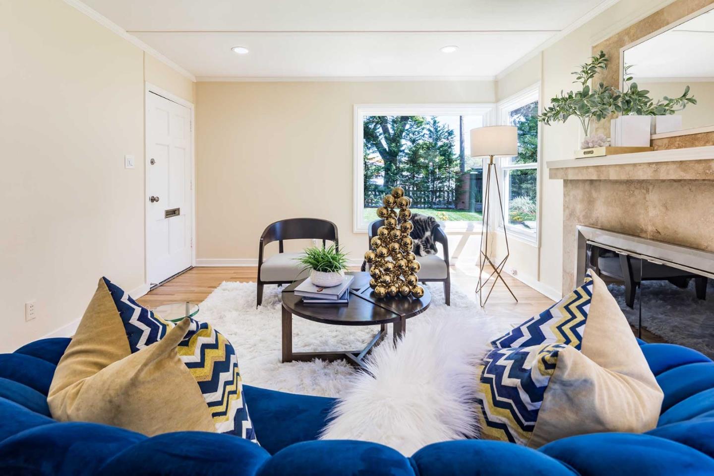 1110 Embarcadero Road Palo Alto, CA 94303 - Photo 6 of 23 a living room with furniture and a fireplace