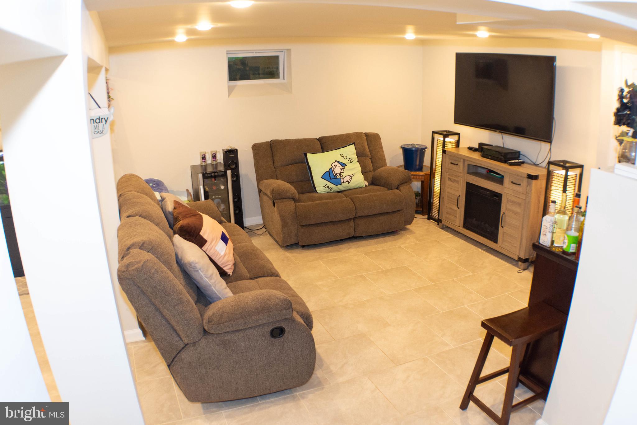 1409 Mt Airy Road Baltimore, MD 21237 - Photo 10 of 42 Lower level family room with full bath