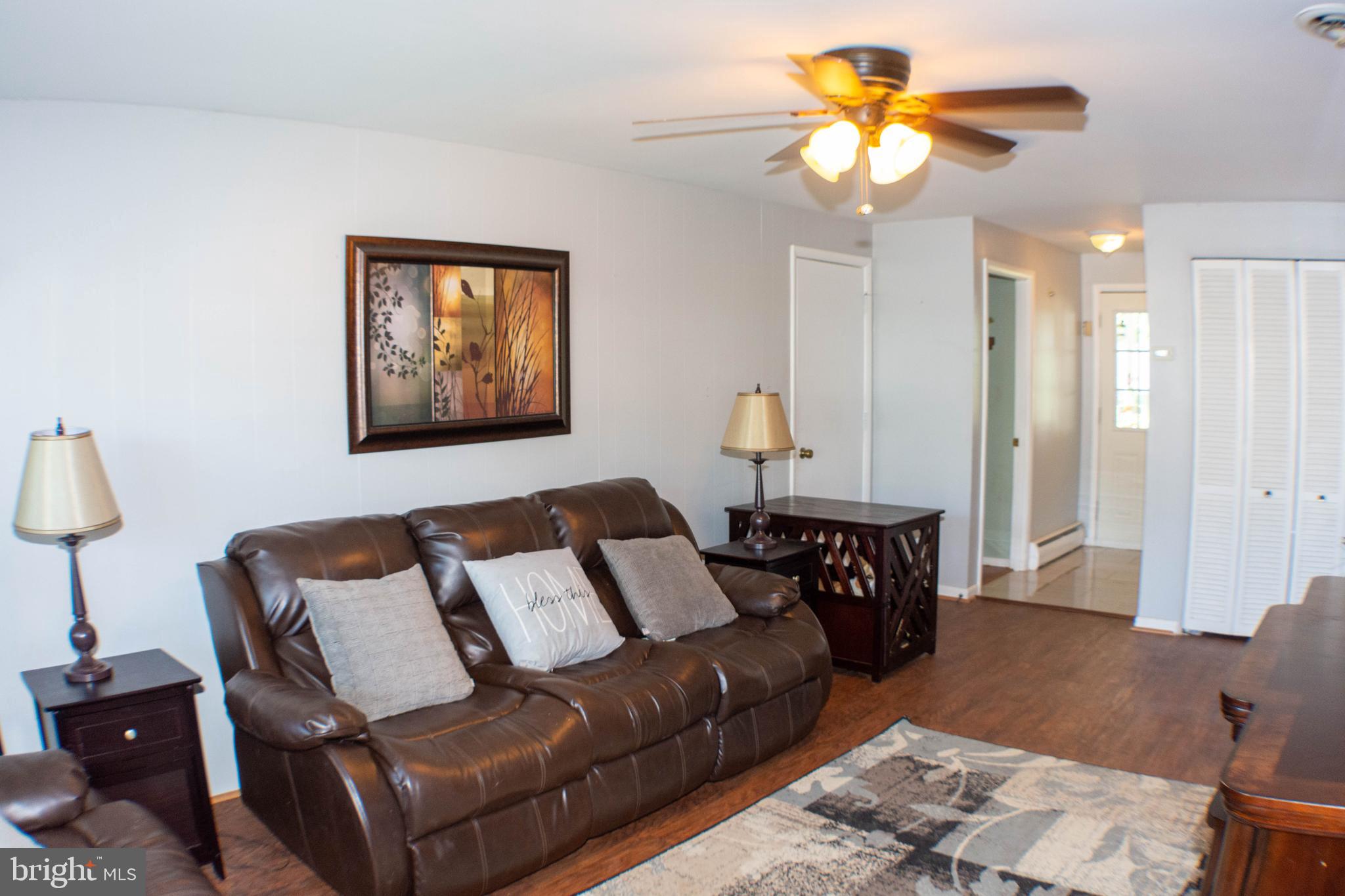 1409 Mt Airy Road Baltimore, MD 21237 - Photo 6 of 42 Family room with 4th BR/office and 1/2 bath