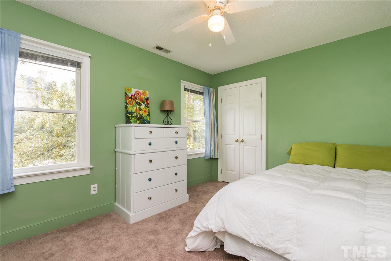 2228 Bufflehead Road Raleigh, NC 27616 - Photo 14 of 20 a bedroom with a bed and a window