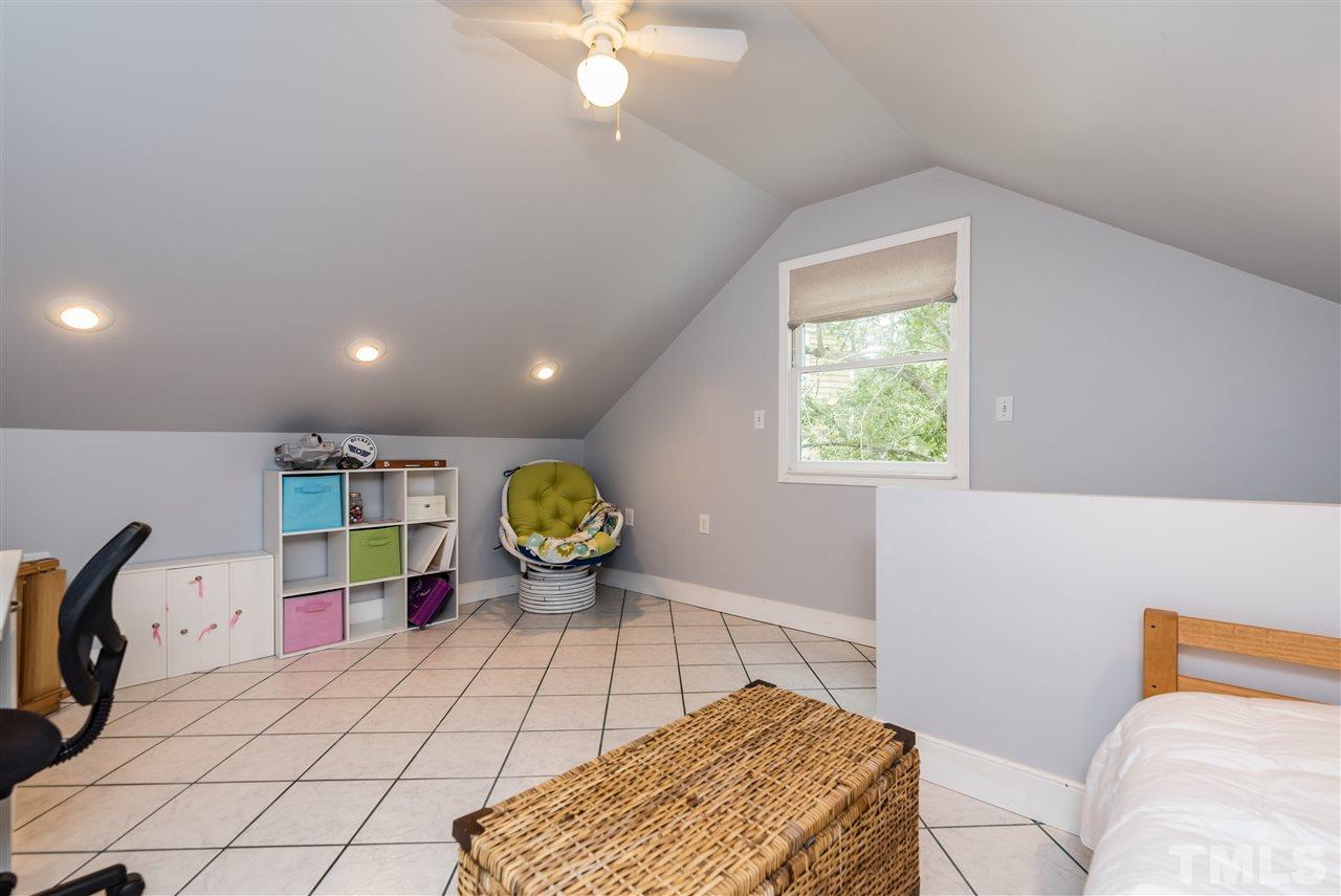 2228 Bufflehead Road Raleigh, NC 27616 - Photo 18 of 20 a living room with a couch