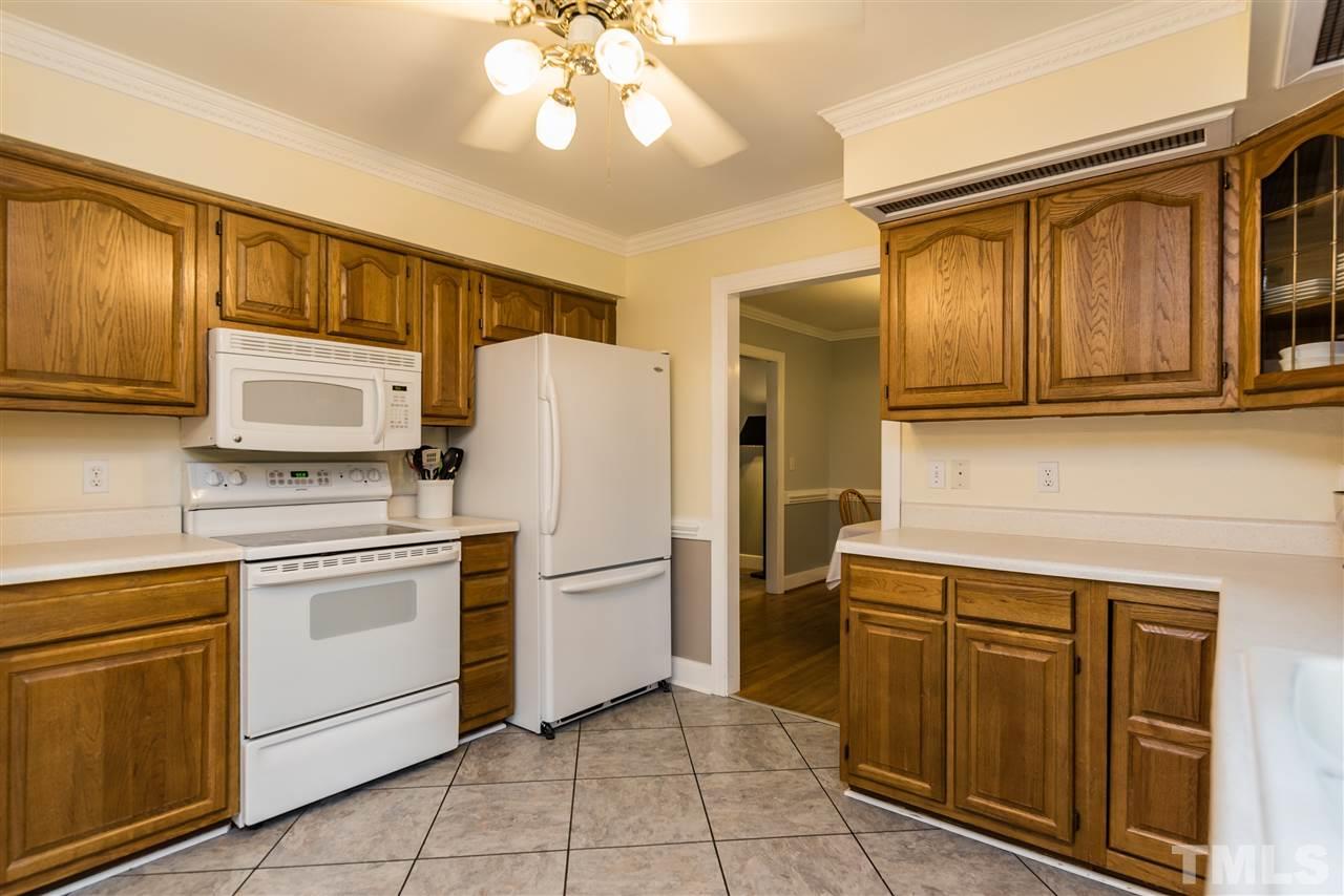 2228 Bufflehead Road Raleigh, NC 27616 - Photo 8 of 20 a kitchen with appliances a sink and cabinets