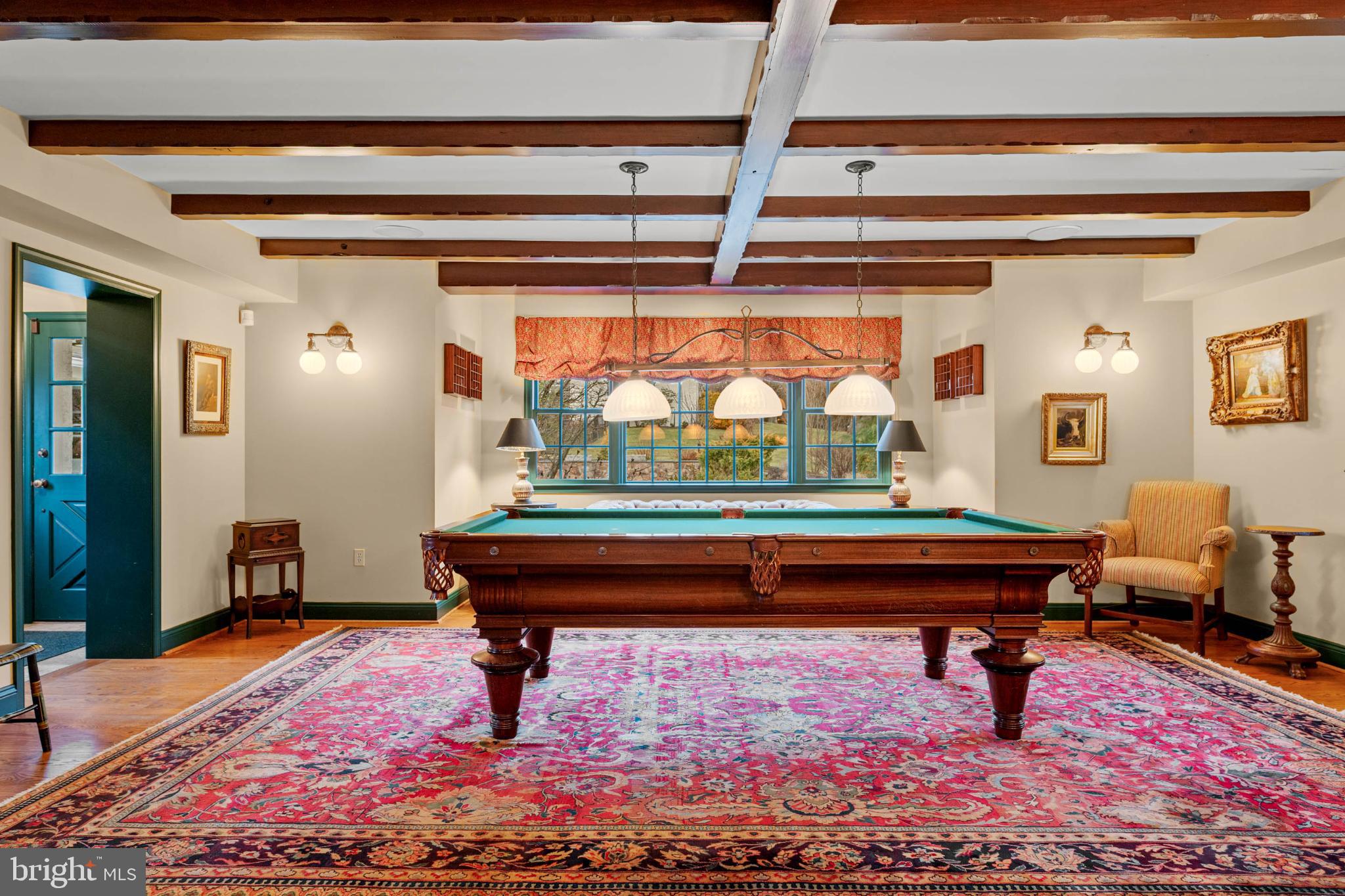 1 Treble Lane Malvern, PA 19355 - Photo 39 of 51 Game room with mud room and walkway to garages.