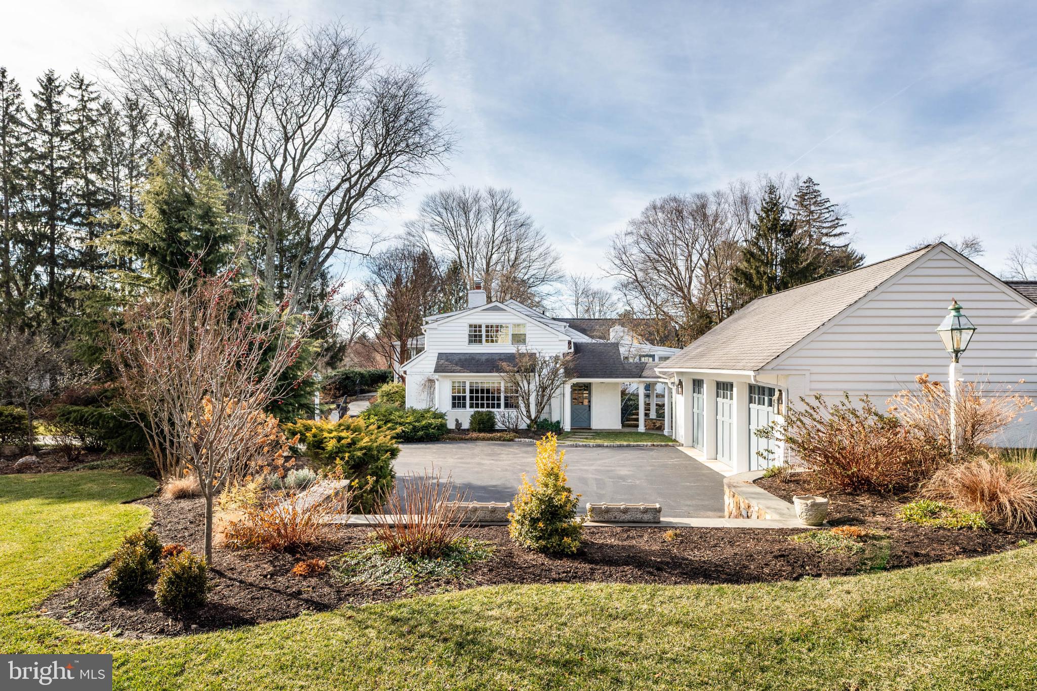1 Treble Lane Malvern, PA 19355 - Photo 6 of 51 Stone wall and landscaping surround parking.