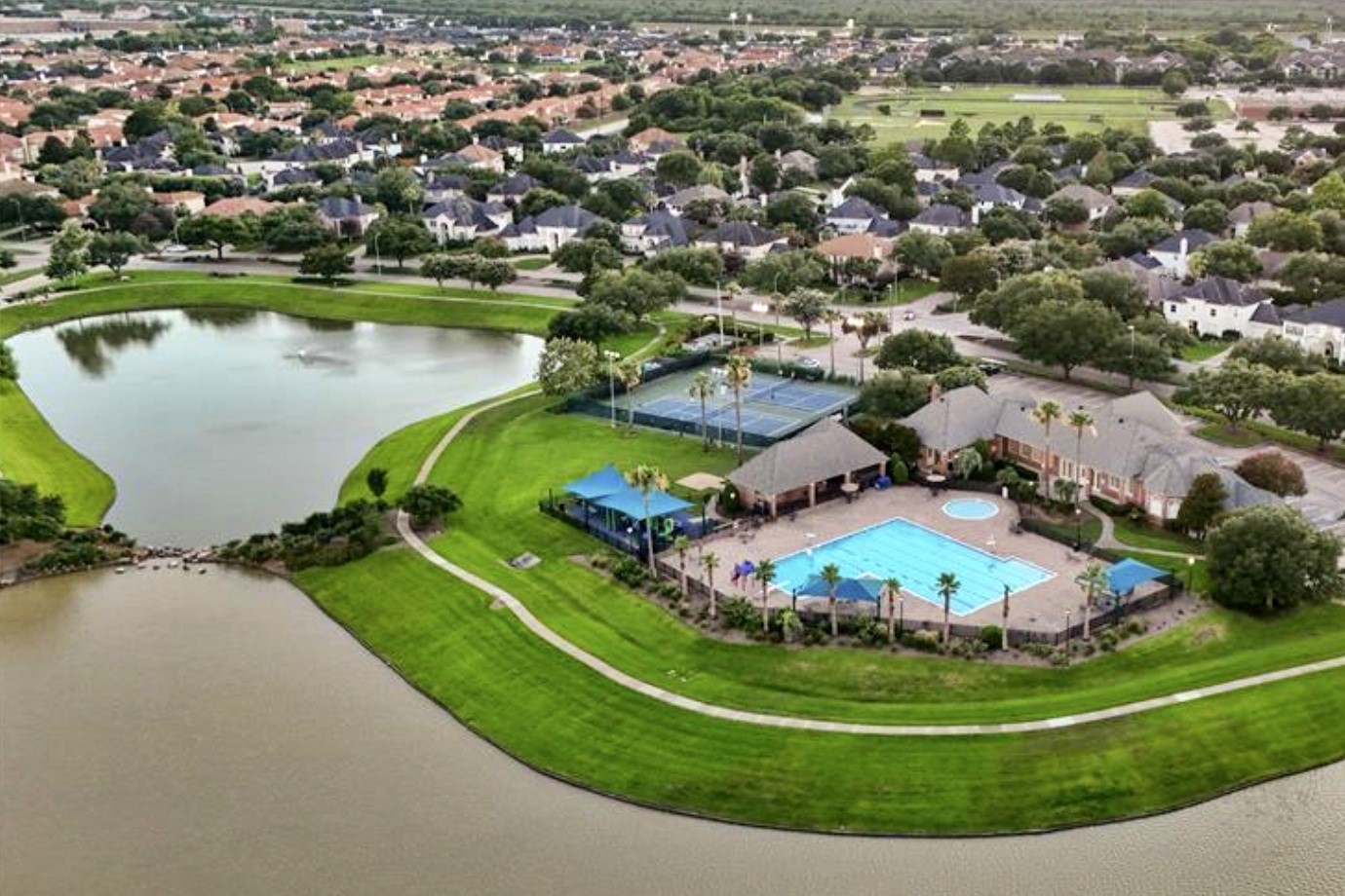 2014 Split Branch Court Houston, TX 77077 - Photo 47 of 47 an aerial view of a house with a garden and lake view