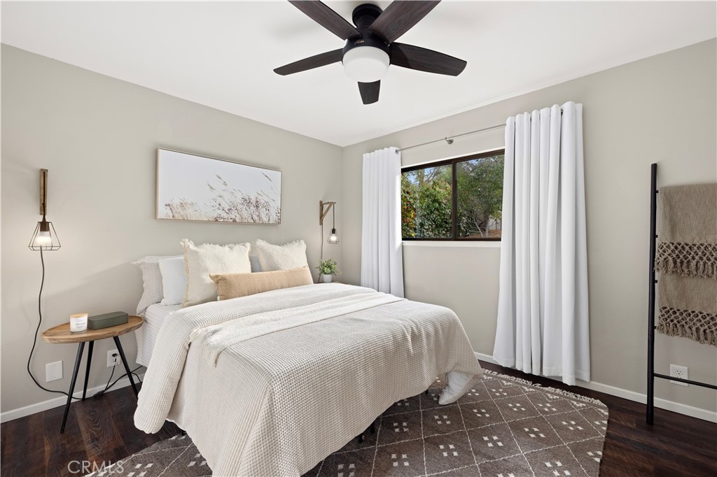 6030 Portola Road Atascadero, CA 93422 - Photo 16 of 44 a bedroom with a large bed and a window