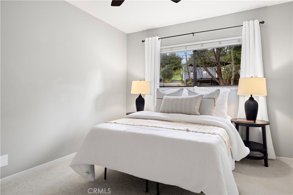 6030 Portola Road Atascadero, CA 93422 - Photo 19 of 44 a bedroom with a bed and window