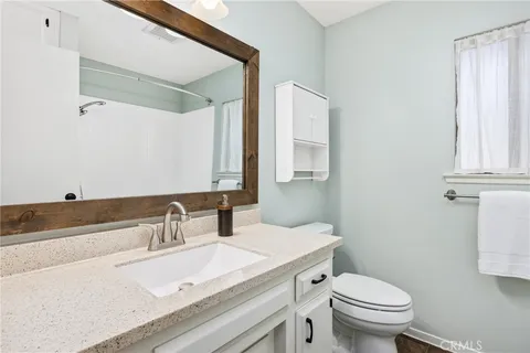 a bathroom with a sink and a toilet