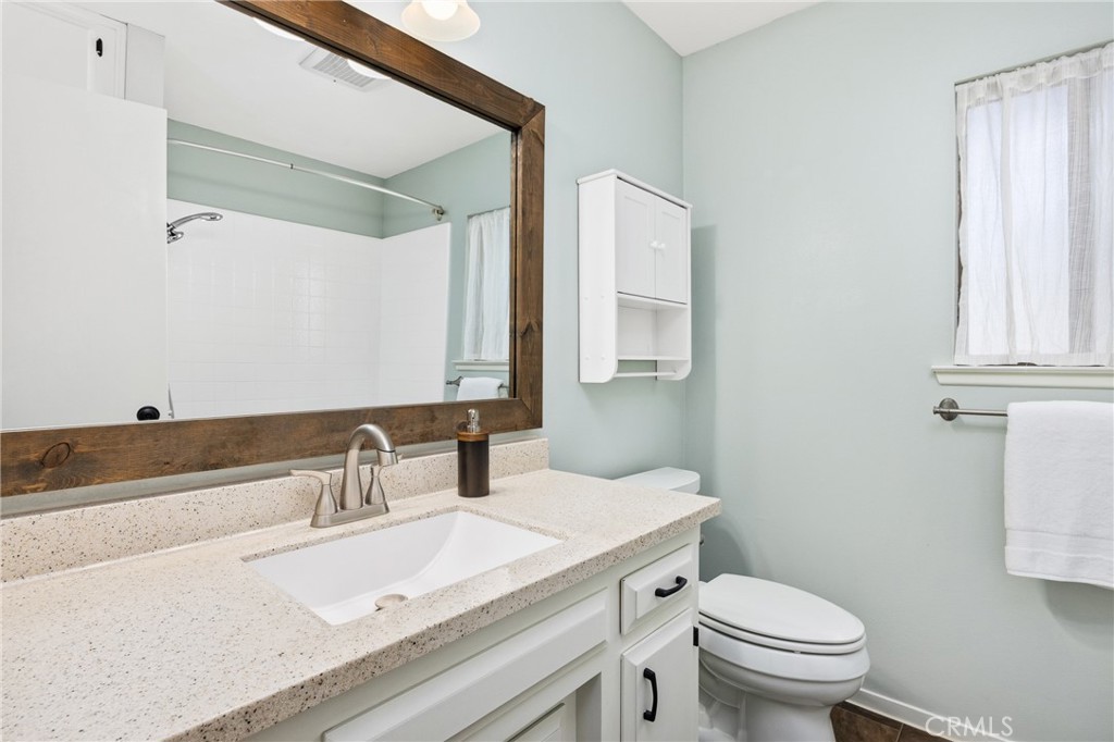 6030 Portola Road Atascadero, CA 93422 - Photo 22 of 44 a bathroom with a sink and a toilet