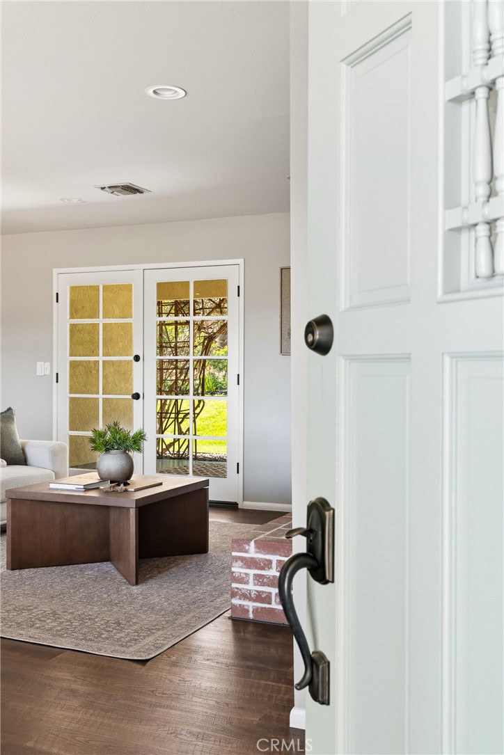 6030 Portola Road Atascadero, CA 93422 - Photo 3 of 44 a living room with furniture floor to ceiling window and a table