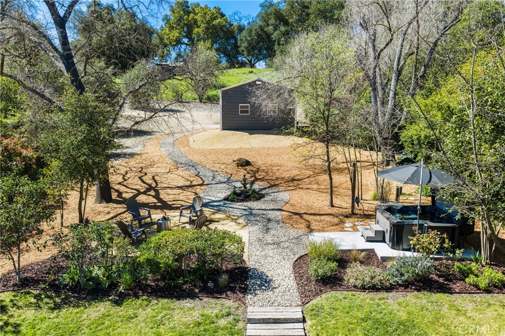 6030 Portola Road Atascadero, CA 93422 - Photo 31 of 44 a view of a yard with plants and large trees