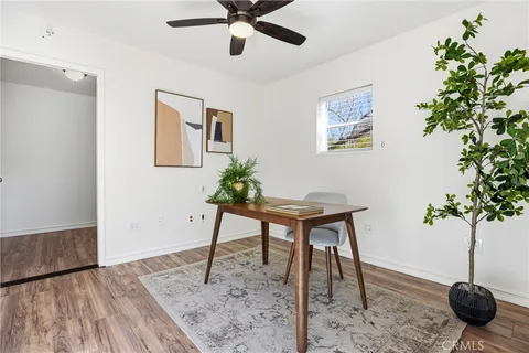 a view of a workspace with furniture