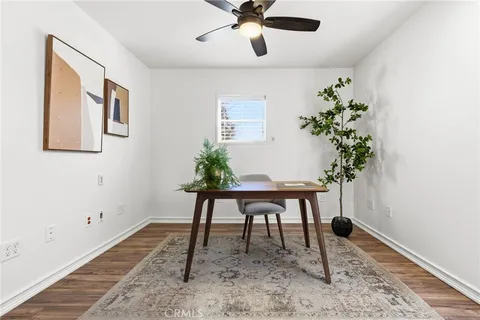 a view of a workspace with furniture