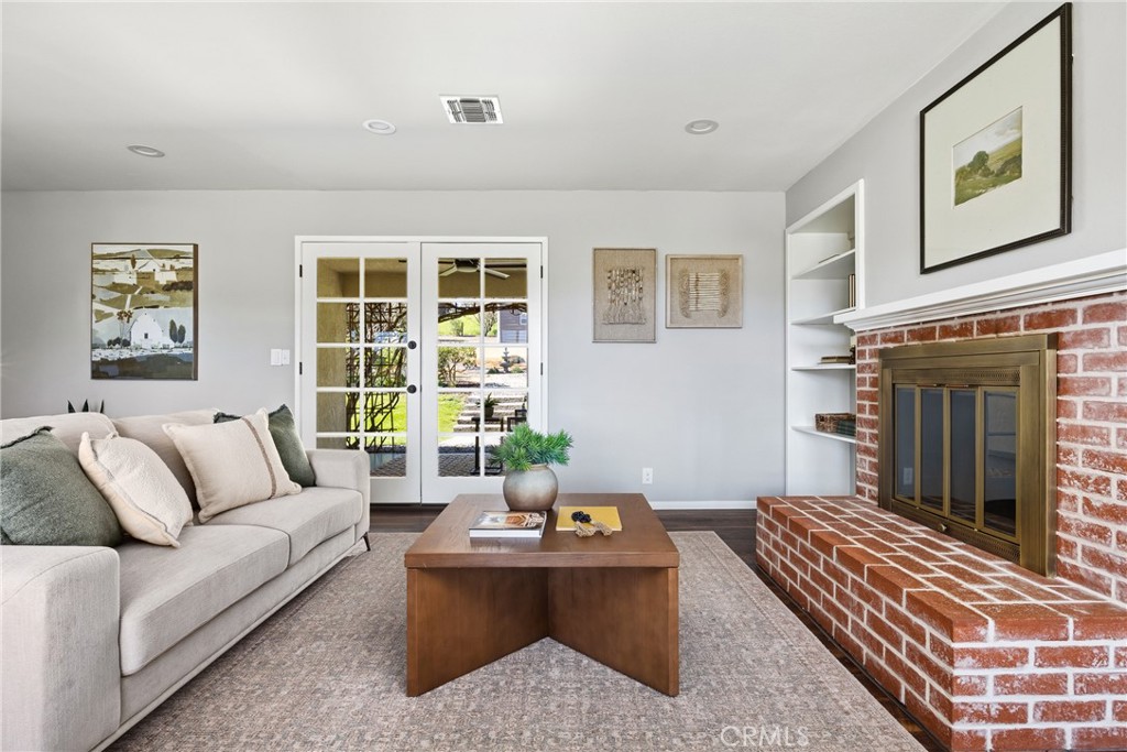6030 Portola Road Atascadero, CA 93422 - Photo 6 of 44 a living room with furniture and a fireplace