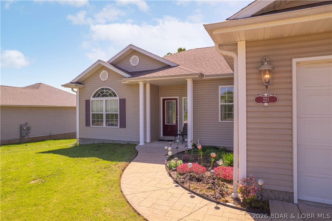 221 Whispering Streams Road Lake Ozark, MO 65049 - Photo 3 of 37