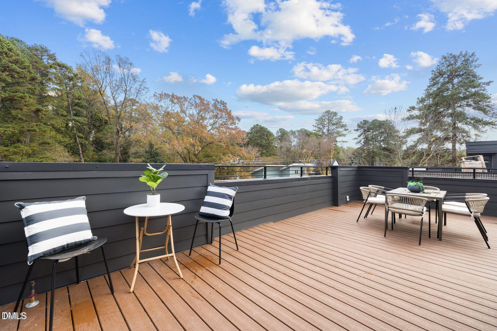 516 Edgecreek Court Raleigh, NC 27604 - Photo 24 of 26 a view of a terrace with seating area