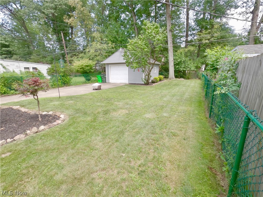 217 Beck Road Avon Lake, OH 44012 - Photo 3 of 18 View of yard featuring a garage