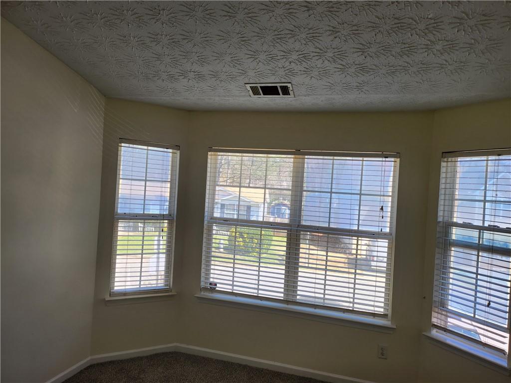 2935 Fields Drive Lithonia, GA 30038 - Photo 12 of 14 a view of an empty room with a window