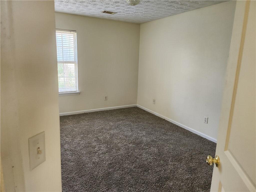2935 Fields Drive Lithonia, GA 30038 - Photo 10 of 14 an empty room with a window