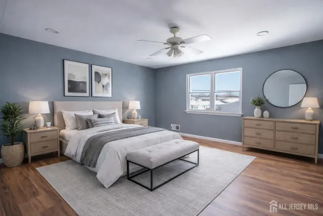 a bedroom with bed and window