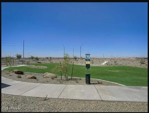 a view of a backyard of the house