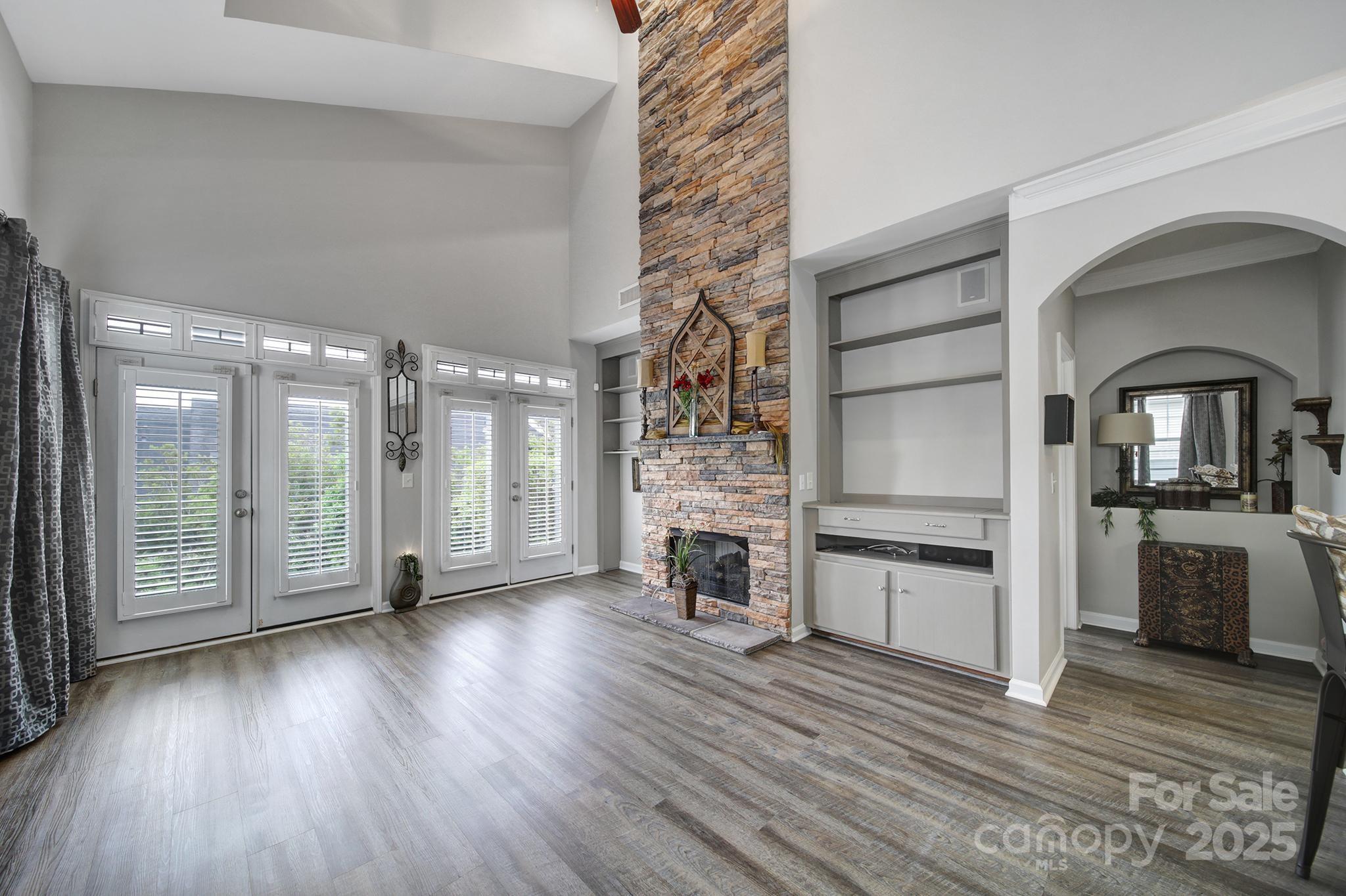 314 Wave Crest Drive Tega Cay, SC 29708 - Photo 12 of 39 a view of a living room a fireplace with wooden floor